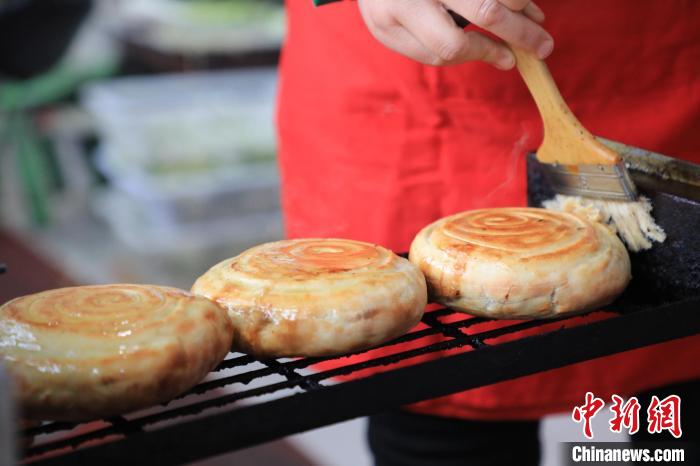 舌尖上的非遗：“延津火烧”添年味